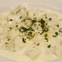 Gnocchi · Homemade potato “dumplings” smothered in your choice of sauce – Vegetarian Marinara, Pesto C...