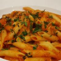 Penne Arrabbiata · Penne pasta tossed in a spicy tomato basil marinara sauce