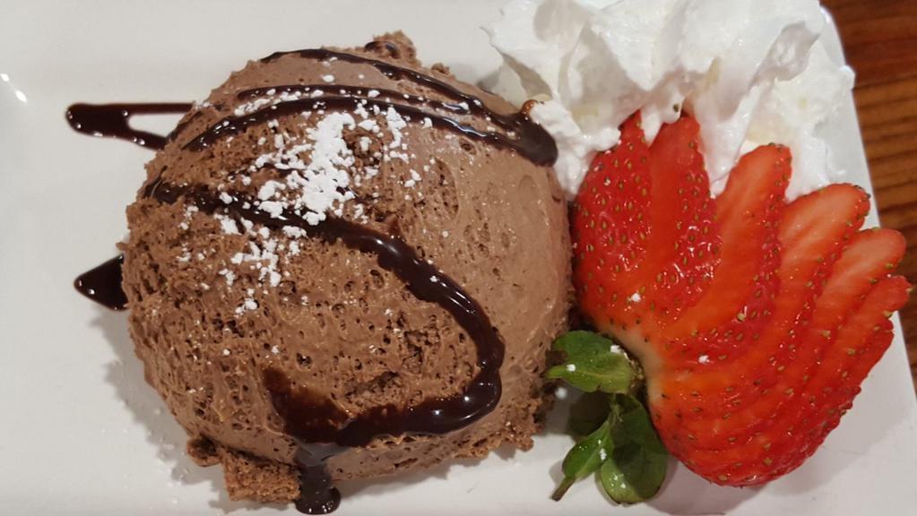 Chocolate Mousse · Made in house from fresh cream and plenty of Belgian dark chocolate, with a sliced strawberry and real whipped cream on the side