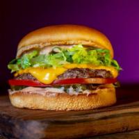 Signature Single Burger · A Single Beef Patty, Lettuce, Tomatoes, Onions, American Cheese, Pickles and Classic Sauce s...