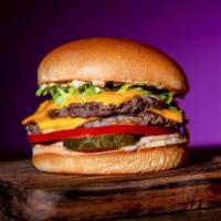 Signature Double Burger · Double Beef Patties, Lettuce, Tomatoes, Onions, American Cheese, Pickles and Classic Sauce s...