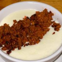 Choriqueso · Great combination of dip cheese and our homemade chorizo (mexican sausage).