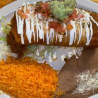 Chimichanga Ranchera · Crispy flour tortilla, choice of ground beef or shredded chicken, jack cheese and topped wit...