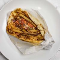 Chicken Shawarma Sandwich · Chicken marinated in special spices, wrapped in a grilled pita bread.