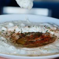 Tzadziki · Yogurt with cucumbers and herbs. Served with warm pita bread and chips.