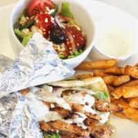 Chicken Gyro Sandwich · chicken breast,lettuce,tomatos,onions,tizdiki sauce.wrapped in pita bread .Served with Greek...