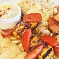 Chicken Breast Souvlaki · 2 skewers Grilled chicken breast, grilled tomatoes and onions with a choice of lemon potatoe...