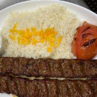 Kaftedakia Plate · 2 Marinated ground beef skewers with white rice and a grilled tomatoes. Served with warm pit...