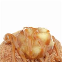 Apple Pie Donut · Coated in cinnamon and sugar, topped with our apple filling and caramel drizzle (optional).