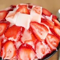 Fresh Strawberry Bingsoo · We stock the fresh fruit daily. Enjoy the fresh strawberry and homemade rice cake.