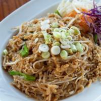 Phad Thai · Thai rice noodles with bean sprouts, green onion and egg stir-fried in phad Thai sauce and s...
