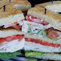 Curt'S Club · Turkey, bacon, Swiss, lettuce, tomato, mayonnaise on toasted White. Double Decker.