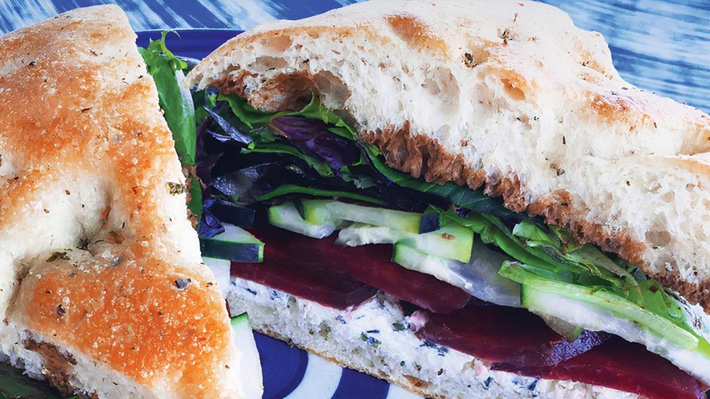 Bailey'S Beet · Beets, goat cheese & herb spread, cucumber, mixed greens, Balsamic Vinaigrette on Focaccia