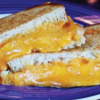 Whole Grilled Cheese · ~ Served HOT ~ Your choice of provolone, sharp cheddar or Swiss cheese on White.