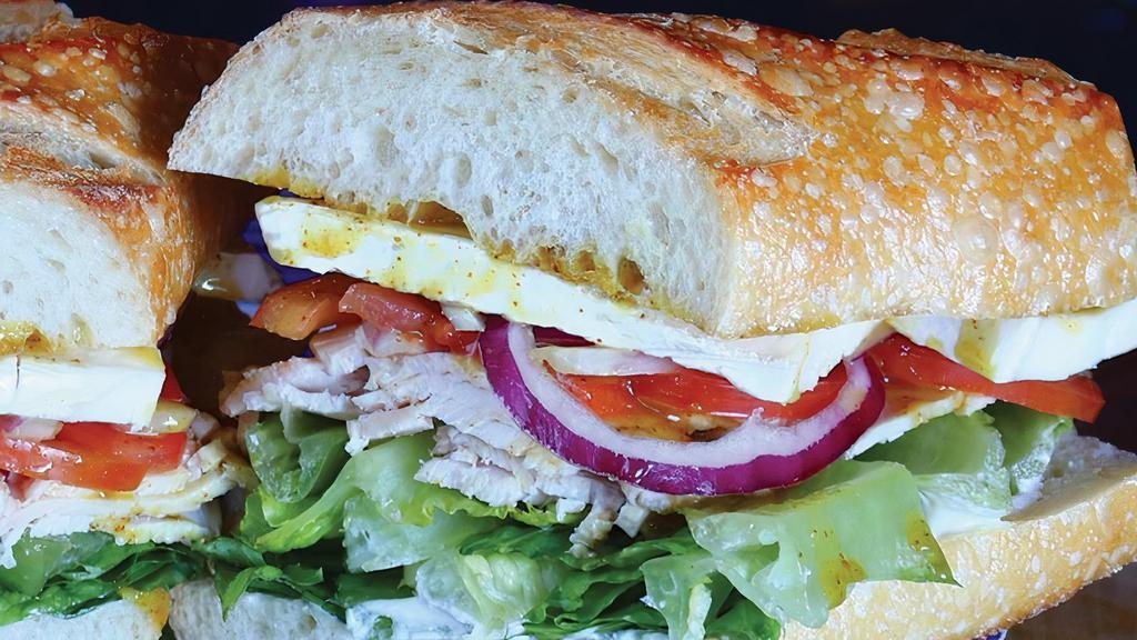 Bart'S Half · Turkey, brie, lettuce, tomato, red onion, honey mustard, mayonnaise on a Baguette.. 🦷Crusty Bread