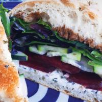 Bailey'S Half · Beets, goat cheese & herb spread, cucumber, mixed greens, Balsamic Vinaigrette on Focaccia.