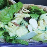 Kalid'S Half · Curry chicken salad, toasted almonds, lettuce in a Wheat Pita.