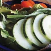 Green Salad · Mixed greens, tomatoes, cucumbers.
