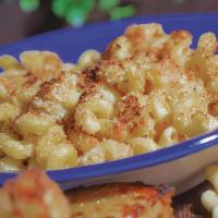 Classic Mac And Cheese · Made to order cellentani pasta with a white cheddar and Parmesan sauce, and house-made Itali...