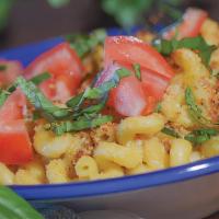 Tomato Basil Mac And Cheese · Made to order cellentani pasta with a white cheddar and Parmesan sauce, tomato, fresh basil ...