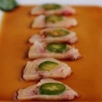 Colorado Style Hamachi · Gluten-free. Hamachi sashimi served with yuzu soy, cilantro, and fresh jalapenos.