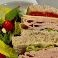 Turkey And Bacon Sandwich · Bread, Mayonaise, Romaine lettuce, Tomato, Turkey, Bacon, Salt and Pepper, Havarti Cheese, B...