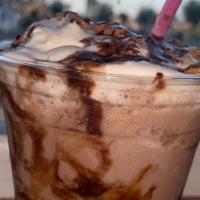 Butterfinger Frappe  · Butterfinger Frappe topped with whip cream and Butterfinger pieces.