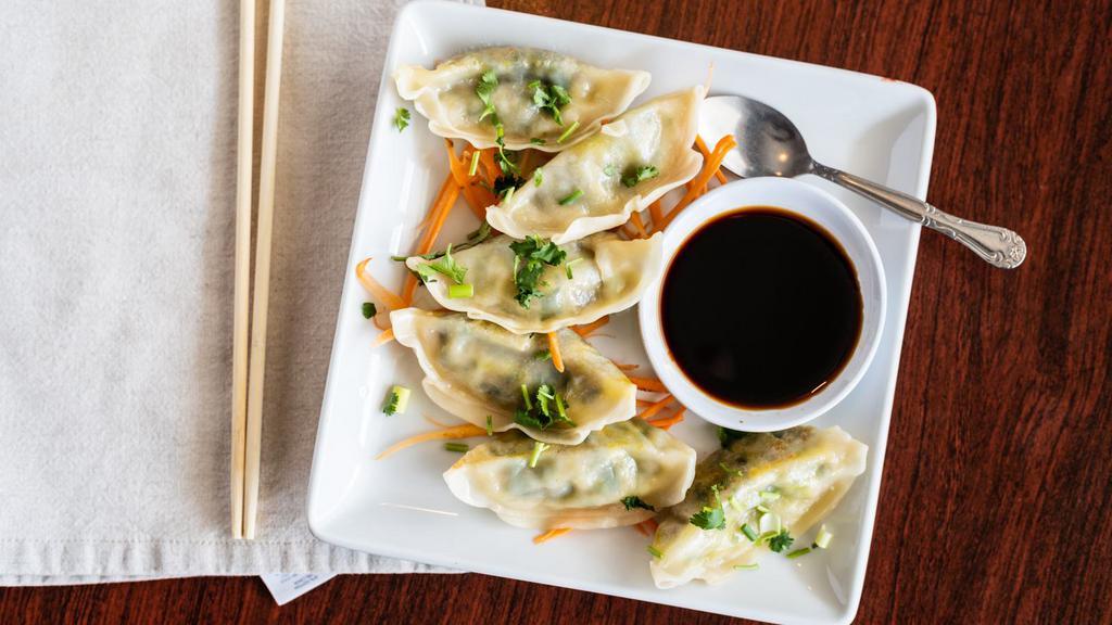 - Pot Sticker (5) · Pan-fried dumpling served with dipping soy sauce.