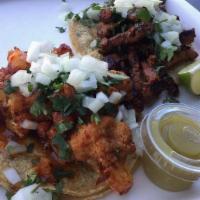  Tacos.* · Gluten-free. Four-inch three sisters organic corn tortillas filled with your choice of tinga...