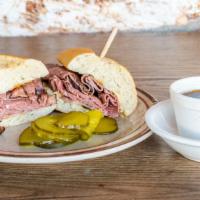 French Dip · Sliced roast beef on a French roll served with au jus.