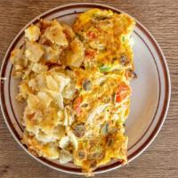Western Omelette · Mushrooms, tomatoes. green peppers, onions, bacon, and sausage. Add cheese for an additional...