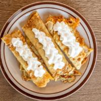 Three Plain Crepes · Served with maple syrup and butter.