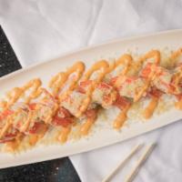 Shaggy Dog Roll · shrimp tempura and avocado inside, crab meat and tempura crunchy outside with spicy mayo sauce
