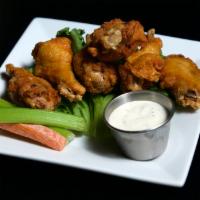 Wings · Bone-in wings with your choice of medium buffalo sauce or Carolina tangy gold sauce.