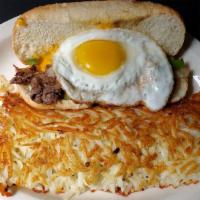 Breakfast Philly Cheesteak · A breakfast version of our classic Philly Cheesesteak sandwich - thinly sliced rib eye or ch...