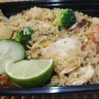 Pineapple Fried Rice · Egg, pineapple, broccoli, onions, tomatoes and yellow curry powder.