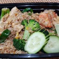Thai Fried Rice · Egg, broccoli, tomatoes and onion.