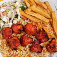 #11 Special Chicken Tikka Kebab · Mediterranean grilled chicken kabobs. Served with two skewers of chicken kabob served with r...