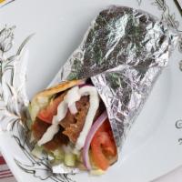 #1 Special Lamb Gyro · Our warm bread filled with lamb gyro. We add in lettuce, tomato, onion, cucumber, and top it...