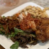 Bulgogi Beef · Gluten free. Pan roasted rib-eye beef, pickled radish, rice, mac salad