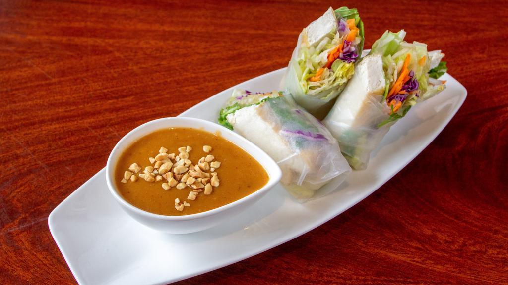 Fresh Salad Rolls (2) · Gluten free, vegan. Green leaf lettuce, iceberg lettuce, carrots, red cabbage, cucumbers, bean sprouts, basil leaves wrapped in rice papers, served with homemade peanut sauce. Add tofu, shrimp, vegetable for an additional charge.