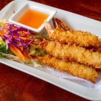 Coconut Shrimp  (6) · Deep fried coconut shrimp served with sweet and chili sauce.