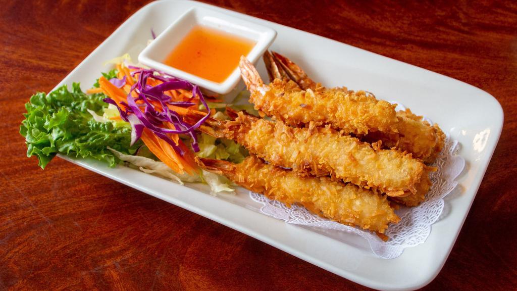 Coconut Shrimp  (6) · Deep fried coconut shrimp served with sweet and chili sauce.