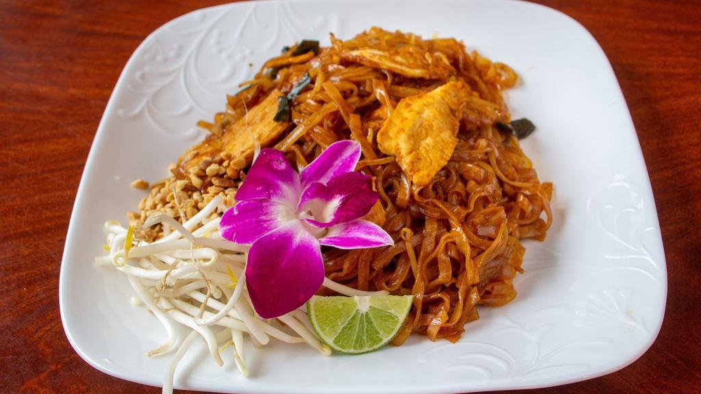 Pad Thai · Thin rice noodles stir-fried with egg, bean sprouts and scallion onions, served with ground peanuts, and a slice of lime. Add vegetables, tofu, chicken or pork,  beef, shrimp or squid, rice for an additional charge.