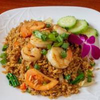 Fried Rice · Thai fried rice with egg, peas, carrots, tomatoes, garlic, onions, scallion onions and black...