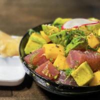Poki Tuna · big eye tuna with hawaiian pink salt, avocado, chili pepper, sesame oil, limu seaweed, & mango