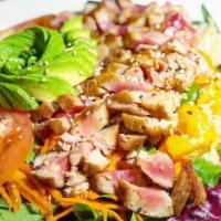 Seared Tuna Sashimi Salad · Seared big eye tuna over mixed greens with honey sesame dressing
