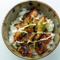 Chicken Teriyaki · Grilled teriyaki chicken on top of a bed or rice with cabbage, Japanese mayo, sesame seeds, ...