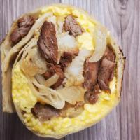 Steak And Egg Breakfast Burrito · Steak, grilled onion, eggs, tater tots, cheddar