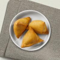 Thai Samosa · Crispy wrapped mix of potato, onion,curry, served with sweet and sour sauce.